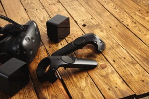 Photo of VR headset and controllers on table.